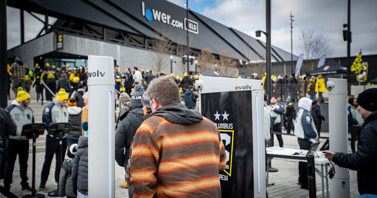 Columbus Crew fans walking into a game, being screened by Evolv Express units