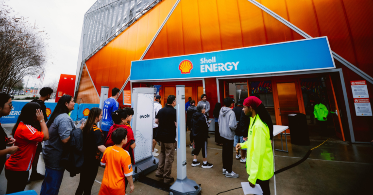 Fans entering Shell Energy Stadium through Evolv Express
